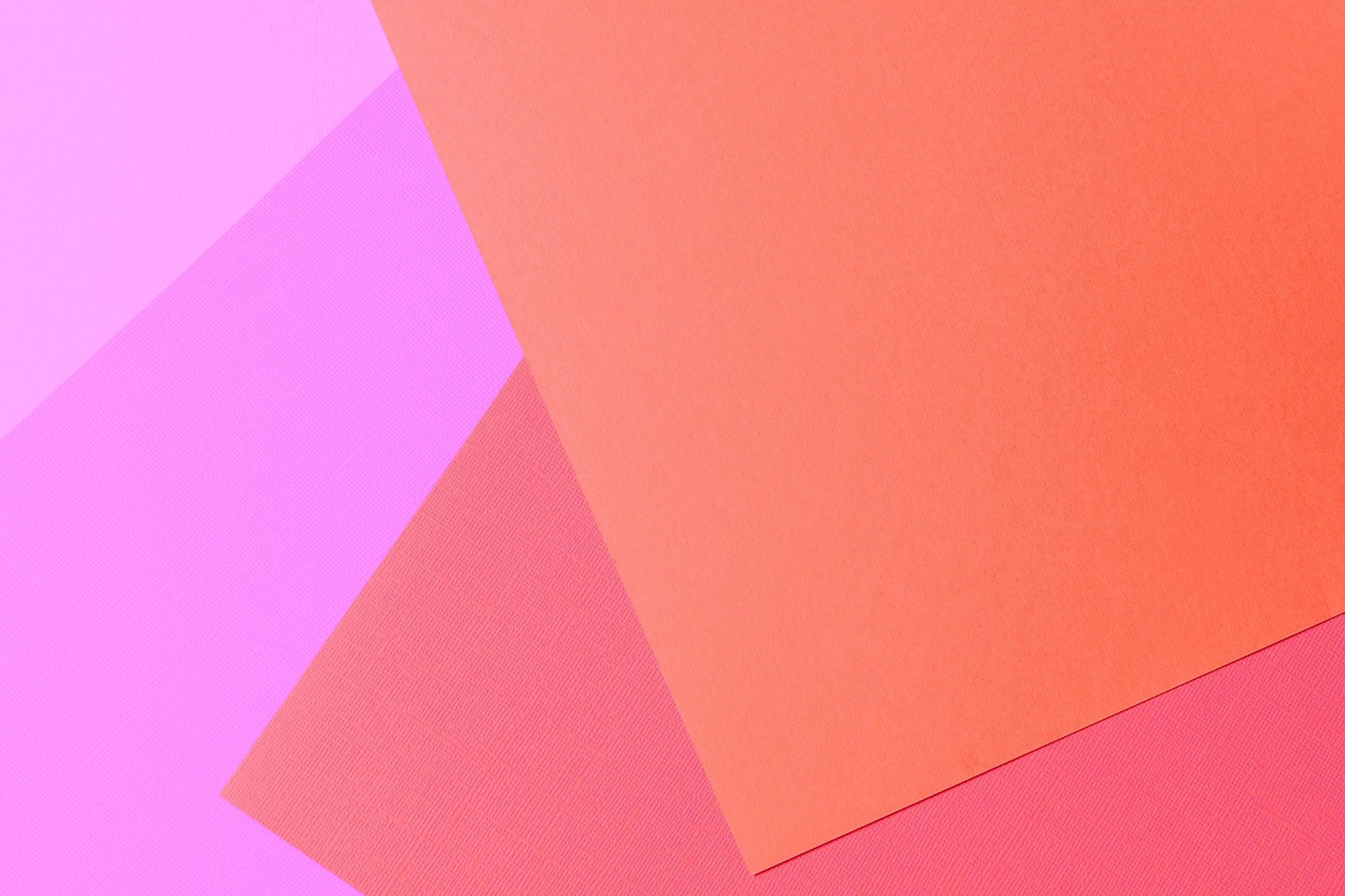 Pastel orange, pink, and purple geometrical shape texture