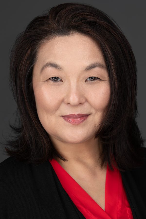 Professional headshot of woman smiling